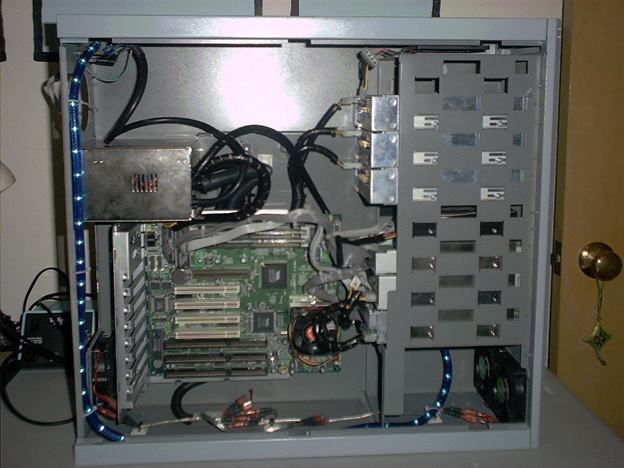 overall view of installed power supply, motherboard, and data cables